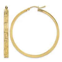 A pair of gold hoop earrings with a textured rectangular pattern along the flat surface, shown from the front and side view.