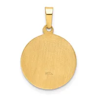 A circular gold pendant with a brushed finish and a small stamped hallmark, suspended from a rectangular gold bail.