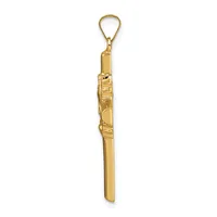 A long, slender gold-toned metal pendant with decorative wrapped detail in the center, suspended from a teardrop-shaped loop at the top.