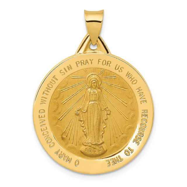 Gold-toned round pendant with a religious figure in the center surrounded by radiating lines, with text around the outer edge and a small stamped hallmark at the bottom.