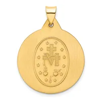 Gold-colored round pendant with brushed finish featuring an oval center medallion with a cross, the letters M and V, hearts, and small stars arranged symmetrically.