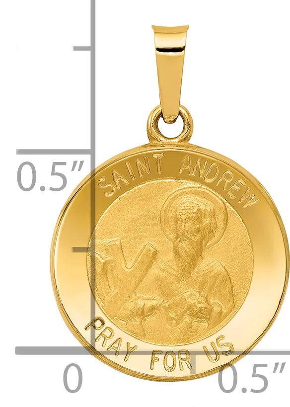 A gold circular pendant showing a relief portrait of a bearded saint on the left and text around the rim, with a small bail attachment at the top, displayed against a measurement scale.