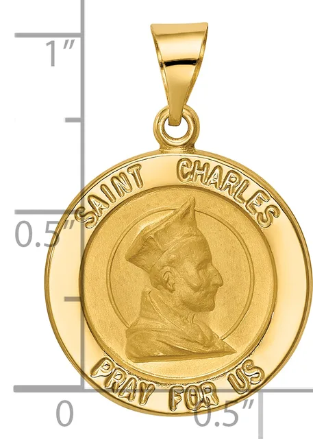 Gold round pendant featuring a profile portrait of Saint Charles with text around the border, shown next to a ruler for scale.