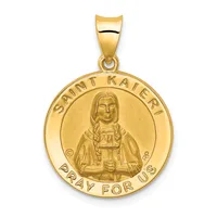 Gold circular pendant featuring Saint Kateri in relief with "Saint Kateri" inscribed at top and "Pray For Us" at bottom, suspended from a gold bail.