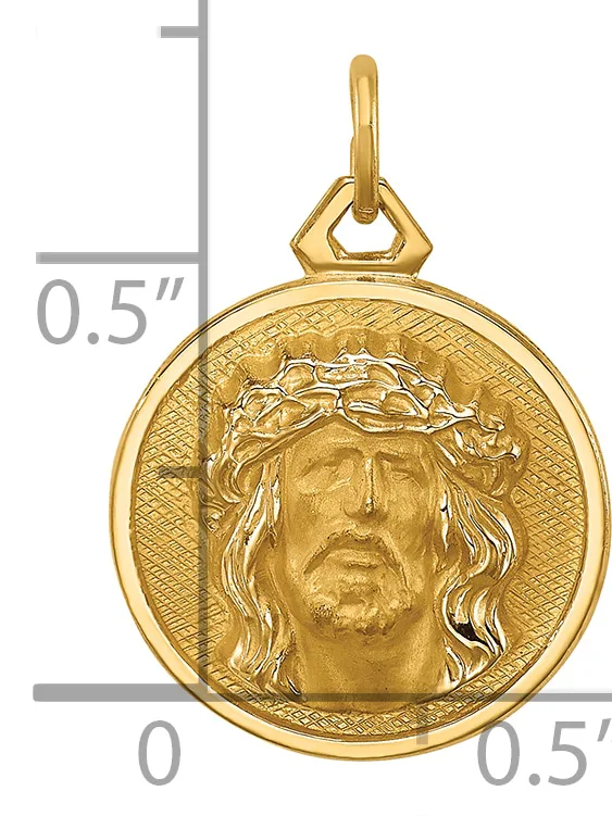 Gold pendant featuring a circular medallion with a relief portrait of Jesus wearing a crown of thorns, suspended from a bale, shown with a measurement scale.