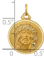 Gold pendant featuring a circular medallion with a relief portrait of Jesus wearing a crown of thorns, suspended from a bale, shown with a measurement scale.