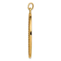 A long gold pendant with textured surface and small black stone inlay, suspended from an oval loop at the top.