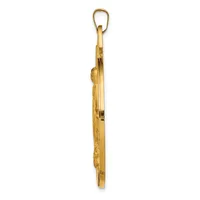 A long narrow wooden pendant with carved relief details and a small metal clasp at the top, shown against a white background.