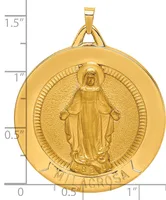 Gold-colored round medallion pendant featuring a religious figure in robes with hands outstretched, surrounded by a textured border, with a measurement scale showing approximately 1.25 inches in diameter.