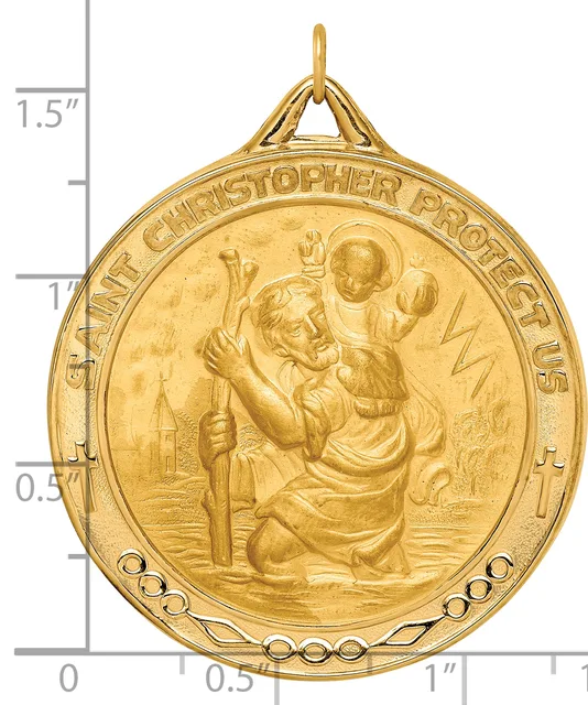 Gold round medal pendant with Saint Christopher carrying Christ child, decorative beaded border, and suspension loop, shown next to ruler for scale.