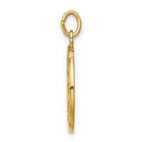 Gold-toned metal pendant with an oval loop at the top and a long tapered bar below, featuring decorative etched detailing along the shaft.
