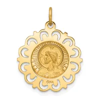 Gold pendant with an ornate scalloped frame surrounding a circular coin featuring a profile portrait and radiating lines.