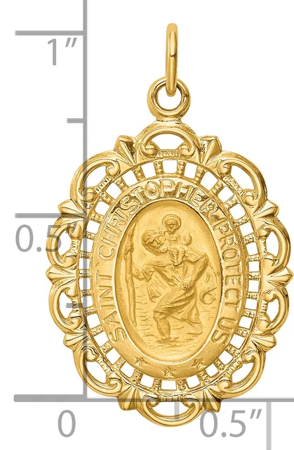 Gold religious medal pendant featuring an ornate oval frame with a relief image of Saint Christopher carrying Christ child, shown against a measurement scale.