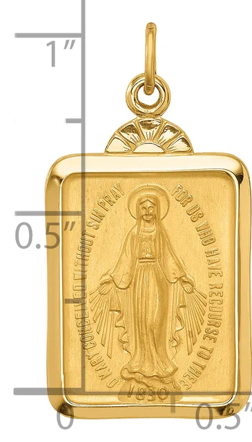 Gold rectangular pendant featuring a relief image of the Virgin Mary with outstretched hands, flanked by a decorative loop bail at top, shown against a measurement scale.