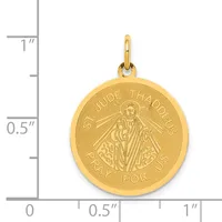 Round gold pendant featuring St. Jude Thaddeus with a cross, suspended from a small bail loop, shown next to a ruler indicating approximately one inch in diameter.