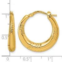 Gold hoop earrings with textured surface detail shown next to a ruler indicating approximately one inch in length.