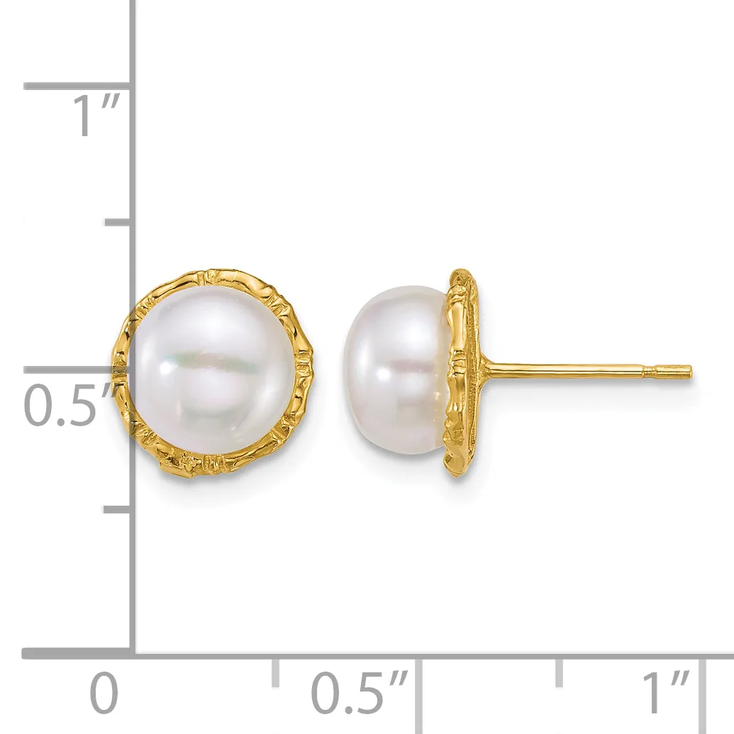 A pair of white pearl stud earrings with decorative gold settings, displayed next to a ruler showing the earrings are approximately half an inch in diameter.