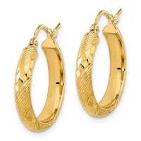 Pair of gold hoop earrings with textured and polished surfaces, shown from the front against a white background.