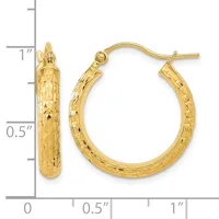 A pair of gold hoop earrings with a textured diamond-cut surface, shown from front and side views against a measurement scale.