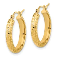 A pair of gold hoop earrings with textured surfaces and polished inner curves, shown from the front against a white background.