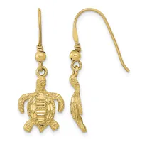 Pair of gold sea turtle dangle earrings with textured shells, shown front and side view, hanging from curved wire hooks with small round beads.