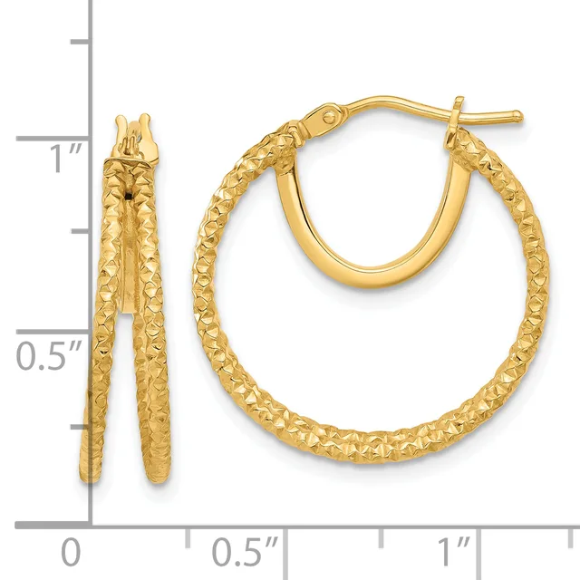 Pair of gold hoop earrings with textured surface and post backs, displayed next to a ruler showing approximately one inch in length.