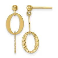 Pair of gold dangle earrings with ball studs and oval frames, one plain polished and one with diamond-cut texture, suspended from delicate chains.