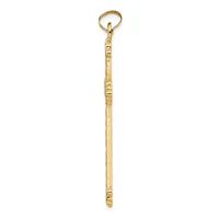 A long, slender gold-colored metal tool with decorative notches along its shaft and a small loop at the top.