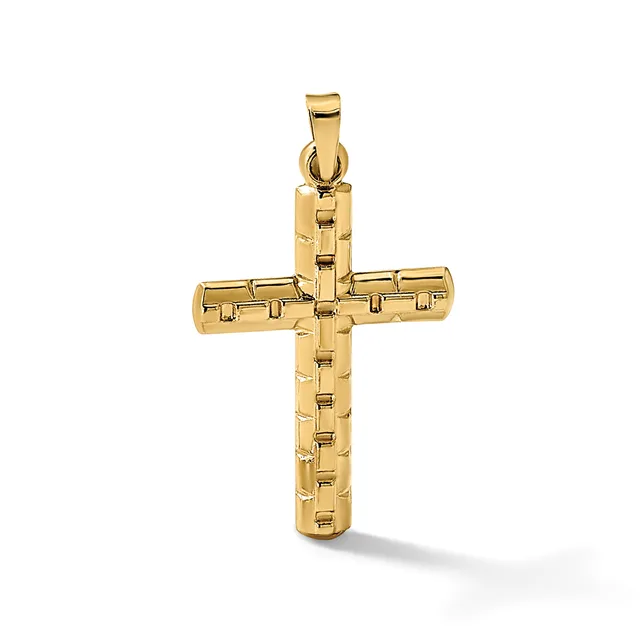 Gold cross pendant with textured rectangular surface pattern, shown against a white background with shadow.