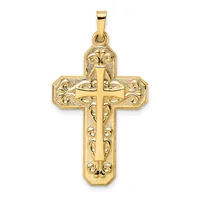 A gold cross pendant with ornate filigree detailing and scrollwork patterns throughout, shown against a white background.