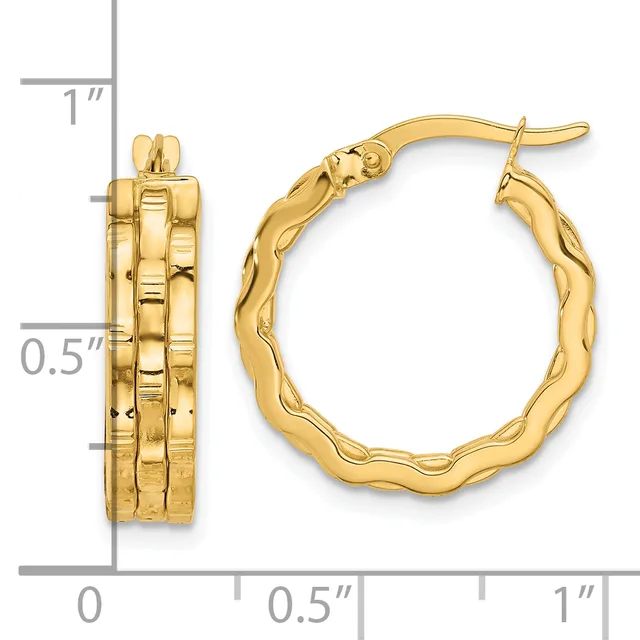 Pair of gold hoop earrings with textured wavy surfaces, shown next to a ruler indicating approximately one inch in diameter.