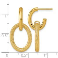 Pair of gold textured hoop earrings with smooth polished tops, displayed next to a ruler showing approximately one inch in length.