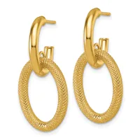 A pair of gold hoop earrings with polished curved posts attached to textured oval-shaped hoops featuring a crosshatch surface pattern.