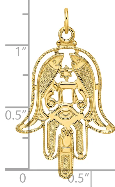 Gold-toned Hamsa hand pendant with Star of David, decorative wings, and ornamental details, shown with a measurement scale indicating approximately one inch in height.