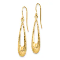 Pair of gold teardrop-shaped dangle earrings with textured surfaces and hook-style ear wires, displayed against a white background.