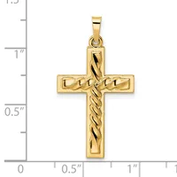 A gold cross pendant with a twisted rope pattern through the center, shown against a measurement scale indicating approximately one inch in height.