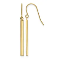 Pair of gold cylindrical tube earrings hanging from a curved ear wire hook, shown against a white background.