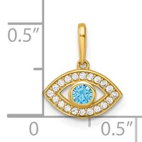 Gold eye-shaped pendant with a blue topaz center stone surrounded by white diamonds, shown with a measurement scale indicating approximately 0.5 inches in width and height.