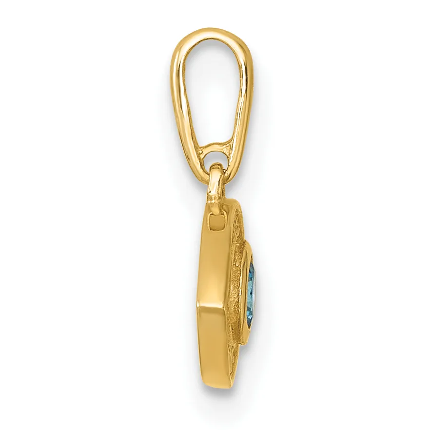 A gold-toned oval carabiner clip with a small rectangular pendant hanging below it, the pendant featuring a blue stone or gemstone set in textured gold metal.