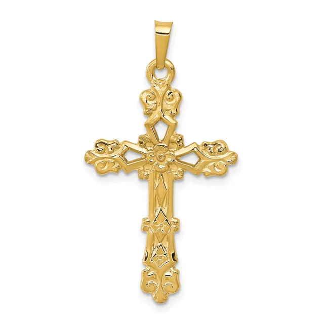 A gold ornate cross pendant with decorative filigree details and scrollwork throughout, suspended from a matching gold bail.
