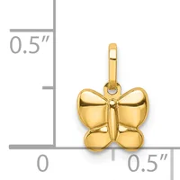 A polished gold butterfly charm with a bail loop, shown next to a measurement scale indicating the charm is approximately 0.5 inches in width and height.