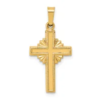 A gold cross pendant with textured borders and decorative fan-shaped elements at the cardinal points, shown suspended from a bail against a white background.