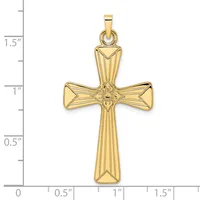 A gold cross pendant with textured vertical lines and decorative floral details at the center, shown against a measurement scale indicating approximately 1.5 inches in height.