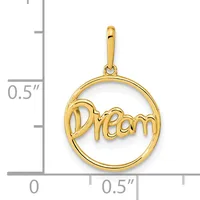 Gold-colored circular pendant with the word "Dream" in script lettering, shown against a measurement scale indicating approximately half an inch in width.