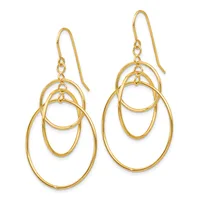 Pair of gold-toned earrings with nested oval rings of decreasing sizes suspended from curved ear wires.