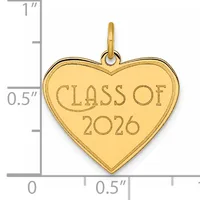 Gold-colored heart-shaped pendant with "CLASS OF 2026" engraved on its surface, shown next to a ruler indicating its size is approximately one inch tall.