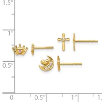 Three pairs of gold stud earrings displayed against a measurement scale: a crown with purple stone, a cross with clear stone, and a crescent moon with heart and clear stones.