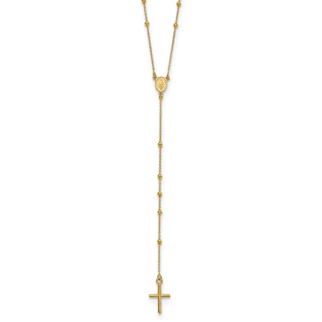 Gold-toned lariat necklace with beaded chain segments and a small oval medallion at the center, terminating in a cross pendant.