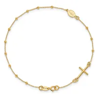 Gold-toned beaded chain bracelet with a cross pendant and a small oval religious medallion charm, displayed on a white background.