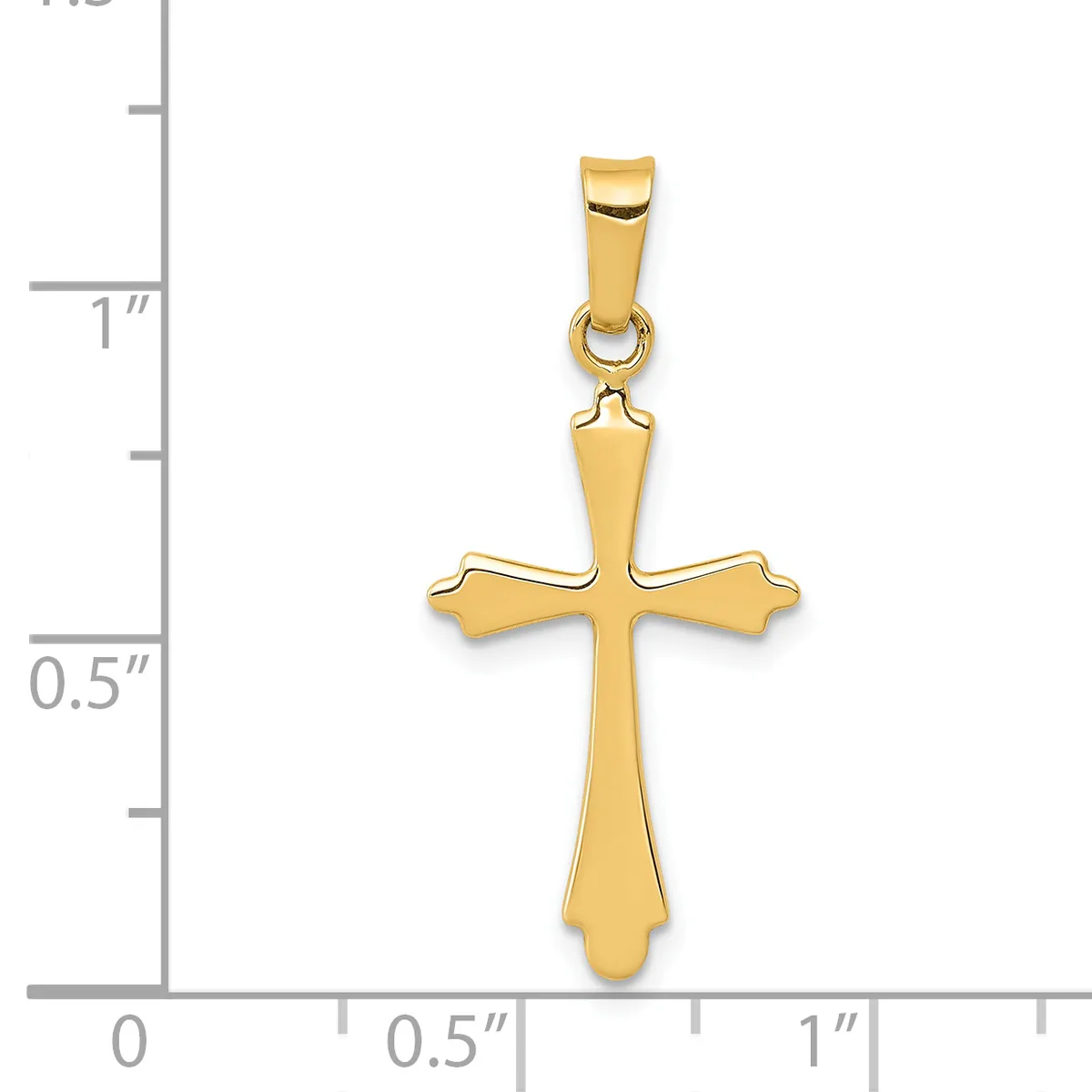 Gold-toned cross pendant with flared ends and a small bail loop at the top, displayed against a measurement scale showing approximately one inch in height.